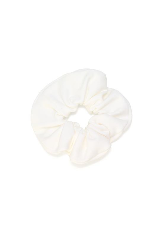 Sustainable white scrunchie crafted from biodegradable, Cradle to Cradle Certified® fabric by Wellicious – a zero-waste, eco-conscious hair accessory